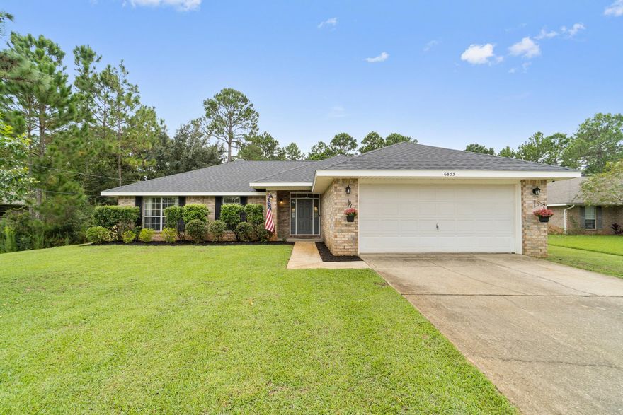 New roof 2021, new HVAC 2020, water heater 2017! Welcome to this true 4 bedroom located in the popular Navarre neighborhood of Holley by the Sea! Pull up into the driveway and appreciate the impeccable curb appeal on this fantastic 0.46 acre lot. Walk inside and tile flooring greets you that extends into the kitchen and from the entryway you'll love the open floor plan with matching tile flooring extending through the living room and find newly replaced carpet only in each of the 4 bedrooms. The spacious living room has a vaulted ceiling and is open to the eat in kitchen space, which leads to the well appointed kitchen with white cabinets and stainless appliances. The split floor plan allows for master bedroom privacy.