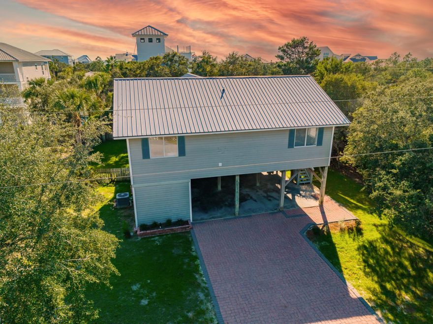 Under contract with a kick out clause. Accepting back up offers. This classic Old Florida style beach home is ideally located South of 30A in Gulfview Heights! Enjoy the expansive lot with it's large private pool, covered deck area, and fenced-in back yard...a welcoming beach retreat for friends and families alike. 34 Buddy Street is centrally located on 30A's west end, just a one minute golf cart ride to one of our area's largest Regional Beach Accesses, and it's just a short walk to Goatfeathers and Local Catch for lunch or dinner! This 4 bedroom, 2 bath home offers an open concept floor plan perfect for entertaining. The large kitchen island will comfortably seat 6 and the vaulted ceilngs create a very spacious feel.
