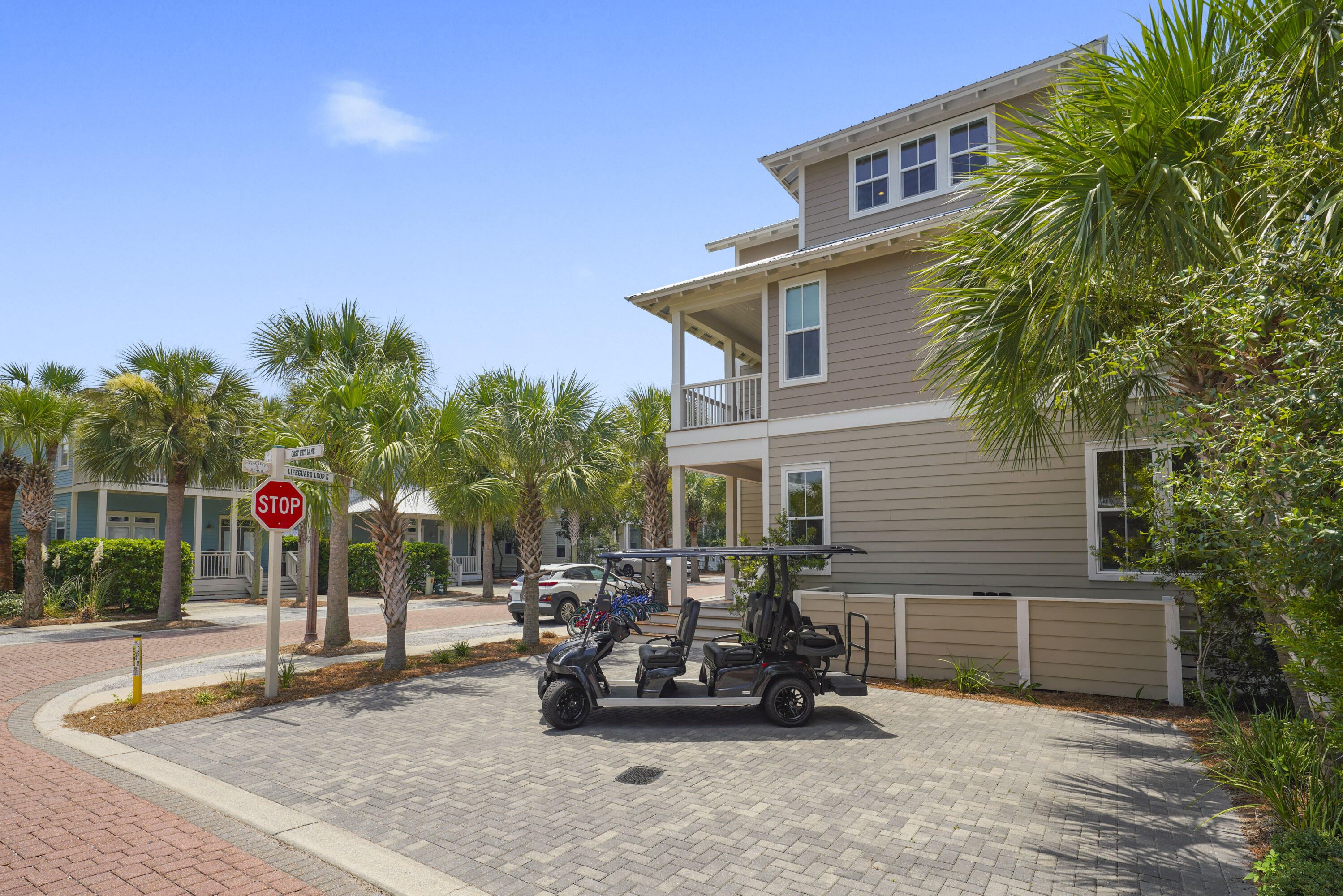 Welcome to 100 Lifeguard Loop East, built in 2020 by award winning Chimar Construction LLC. This fabulous family beach home, located in the renowned Seacrest Beach community and nestled between Rosemary and Alys Beaches boasts beautiful hardwood floors, custom cabinetry, Wolf cooktop and stainless appliances. Ideal for your family's coastal getaway or an amazing investment opportunity, this home has four bedrooms and five full baths. One bedroom has four custom bunks and a dedicated playroom for the kids!! Inviting outdoor porches and an outdoor grilling area help make this beach home your perfect vacation destination. The home conveys fully furnished and rental ready, including the relatively new 2022 STAR Sirius 4+2 six-seater golf cart. Shuttle service is provided to the neighborhood's dedicated beach access and the 12,000 square foot community pool and poolside caf??--- you'll never escape paradise while vacationing at "100 Lifeguard Loop East".
"100 Lifeguard Loop East" welcomes you with brand new furnishings and a corner lot with a driveway that can accommodate up to 5 cars and additional open parking in front of the home. Offering an open-concept first-floor main living area with a spacious living room, kitchen, and dining area, you'll entertain and relax together and delight in whipping up a home-cooked meal in the well-stocked gourmet kitchen, then enjoy it at the dining table with banquet style seating for ten. After a day at the beach, take advantage of the gas grilling station and unwind on the roomy porch garnished with an additional flat-screen TV.
Making your way upstairs, you're sure to get the R&R you deserve in the master suite, furnished with a king-size bed and a private ensuite. Just down the hall, family or guests will sleep soundly in the guest bedroom furnished with a queen-size bed and access to a private ensuite. Additional sleeping for four is also located on the second floor in a second guest bedroom furnished with two full-size beds and private ensuite. The kids will have sweet dreams in the third-floor bunk room, furnished with two twin beds and full bunk beds and an additional twin daybed with a private ensuite, as well.
There is storage galore provided by the large storage and owners' closets. Outside. there is a huge storage closet with room for all the beach toys, chairs, wagons, tents, paddle boards or Kayak.
When not at the beach or pool you can take a short stroll or bike ride along the paved paths to the shops and restaurants at the adjacent communities of the Village of South Walton and Rosemary Beach. In addition, Pier Park, a new complex of shops, restaurants, activities, and a multi-screen theater is only a short fifteen-minute drive away. You will leave with unforgettable memories and hopefully will plan another visit to "100 Lifeguard Loop East"
Seacrest Beach Community Overview:
- Tram Service to the Beach (Seasonally)
- Boutique Shopping and Gourmet Cuisine
- Quaint Coastal Community - Bike Friendly!
- Neighboring Communities - Rosemary Beach and Alys Beach
- Home to South Walton's Tallest Sand Dunes
- Expansive "Tropical Paradise" Pool Deck
- 12,000 sq ft Lagoon Pool with Waterfall Features
- Zero-entry Splash Zone
- Poolside Cafe with Picnic Area
- Ample Loungers and Umbrellas for Sunbathing
Important Things to Know:
There is an active ring doorbell camera at the entrance door of the home.