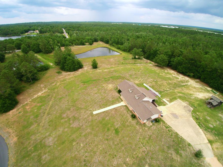 Go fishing in your backyard! 4.07 ACRES + POND complete this one of a kind property! This vintage Crestview home is the perfect blend of new and rustic, ready for new owners! This is a custom built, 1 owner home that was constructed by one of the area's finest builders. This home was originally built in 1978 by Tew Construction and completely renovated in 2009. ALL NEW: shingles, siding, decking, windows, 2 gas furnaces, duct work, insulation, wiring, plumbing, cabinets, countertops, paint, flooring. Home features a ton of space: 5 bedrooms, 3 bathrooms, along with 2 family rooms and a formal dining space. There is an additional 2000 square feet of unfinished basement space, primed and ready for you to make it your own. FANTASTIC views in every direction!