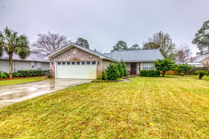 Welcome Home! You will fall in love with this remodeled beauty in a quiet neighborhood on the north side of highway 98 convenient to beaches, shopping, restaurants and everything Walton county has to offer.This home has it all: Updated Kitchen with slate appliances, 2 bars which are perfect for entertaining, ample storage, and granite countertops.The living area is large and the vaulted ceilings with skylights keep it bright and airy.There are 3 bedrooms, and the master has an ensuite bathroom which has been gorgeously remodeled and has a soaking tub in addition to a large glass shower.The additional guest bathroom is remodeled to perfection!Off the garage is a large laundry/ mudroom/ bonus space before you enter the home.