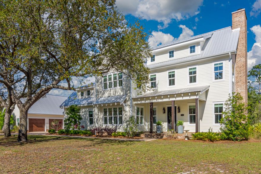Prestigious home in Daughttes neighborhood on the water! This stunning home features all high end stainless steel appliances! Sub-Zero refrigerator, Wolf 6 burner gas stove, beautiful hardwood flooring, quartzite countertops! The serene outdoor space opens up to a beautiful outdoor kitchen, pool, hot tub, and outdoor fireplace, with a dock & two boat lifts! Perfect for entertaining guest!This home is a must see! schedule your showing today!