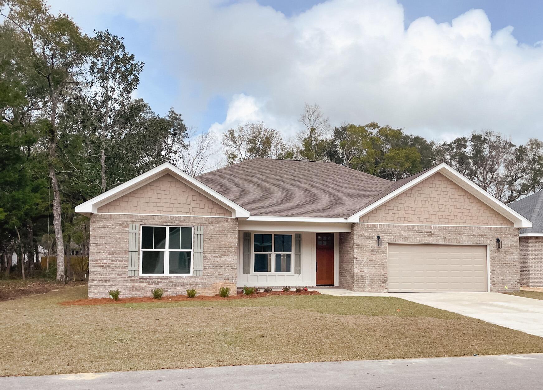 ONLY 4 miles from Niceville and a quick drive over the Mid-Bay Bridge to the stunning sugar-white beaches. This custom-built home showcases high-end designer finishes and a spacious open-concept layout that enhances its elegant feel. The gourmet kitchen is a chef's dream, featuring custom cabinetry, luxurious white quartz countertops, large island, pantry and top-tier finishes throughout. The primary suite offers a spa-like retreat with a large walk-in Zero Entry shower, private water closet, and an oversized walk-in closet. Of the four generously sized bedrooms, three include their own walk-in closets, providing ample space and storage for the whole family. Covered front and back porches provide ample relaxing or entertaining areas. Large open Living room and Kitchen design. Perfect for the small or large family.
Located in a brand-new subdivision with underground utilities, it sits on a quiet, family-friendly dead-end street. For boating enthusiasts, it's only a block from the boat ramp and Choctawhatchee Bay.