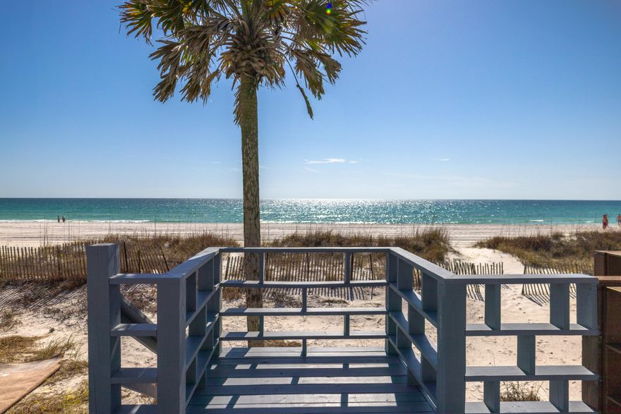 Gulf-front living at its finest! This delightful townhome is located in the charming and highly sought-after Surf Drive area, offering breathtaking views and direct beach access. No elevators are needed--just step right onto the sand! Plus, it comes with two parking spaces for added convenience. The main level features an open-concept living, dining, and kitchen area with large windows and French doors that lead to a spacious patio and expansive waterfront deck. Enjoy the sights, sounds, and fresh salty air of beachfront living right from your own backyard. A conveniently located ground-floor bedroom and full bathroom make this layout ideal for guests.  Upstairs, the oversized Gulf-front master suite boasts its own private balcony with stunning ocean views (SEE ADD REMARKS) CONTINUED while the guest bedroom also features a private balcony. With three bedrooms and three full bathrooms, this townhome offers plenty of space for family, friends, and vacation rentals. Situated on a 150 ft. deep lot, there's ample room for beachfront fun and relaxation. Plus, you're just minutes from dining, shopping, and entertainment for both kids and adults. Sold fully furnished and move-in ready, this is the perfect opportunity to own your piece of paradise!