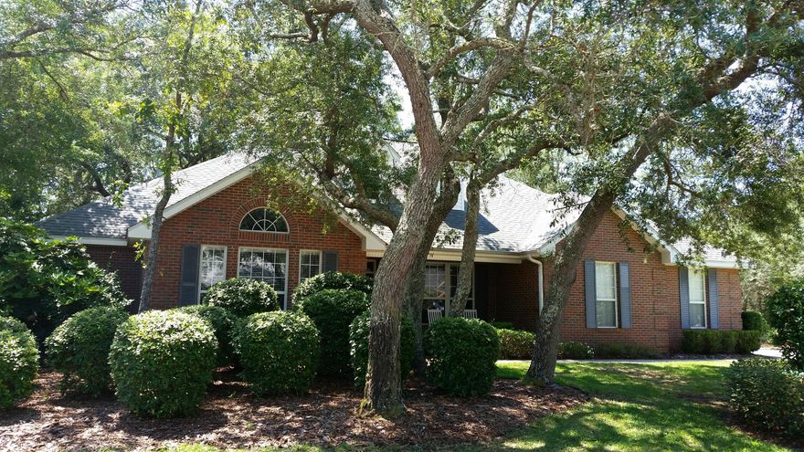 This beautiful brick home which is located in Southwind at Bluewater Bay has much to offer. The home is located on a corner lot with professionally landscaped yard and irrigation system. The interior of the home boast hardwood floors, architectural columns and Trey ceilings in the formal dining room and master bedroom as well as recessed lighting. The master bedroom bath has a step in shower, whirlpool tub and cultured marble countertops. Large kitchen and eating area that features an island, tile floors and stainless appliances.