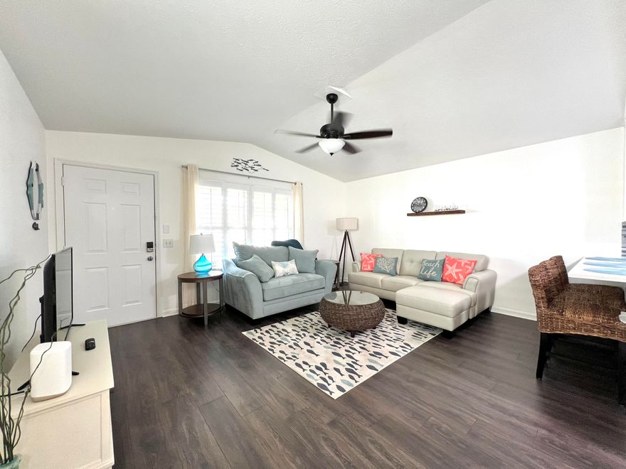 Welcome to this beautifully furnished beach side condo--an ideal choice for a vacation getaway, investment property, or full-time residence. Thoughtfully decorated with stylish coastal accents, this bright and airy unit offers a warm, inviting atmosphere from the moment you walk in. Enjoy year-round comfort with a brand-new AC unit.. The open-concept layout provides the perfect space for entertaining or relaxing with family and friends. Situated just moments from the sugar-white sands of Panama City Beach and a short drive to Pier Park, top-rated restaurants, shopping, and entertainment, this location can't be beat. Community amenities include a sparkling pool, tennis courts, and more, ensuring every day feels like a vacation. All measurements are approximate and should be verified.