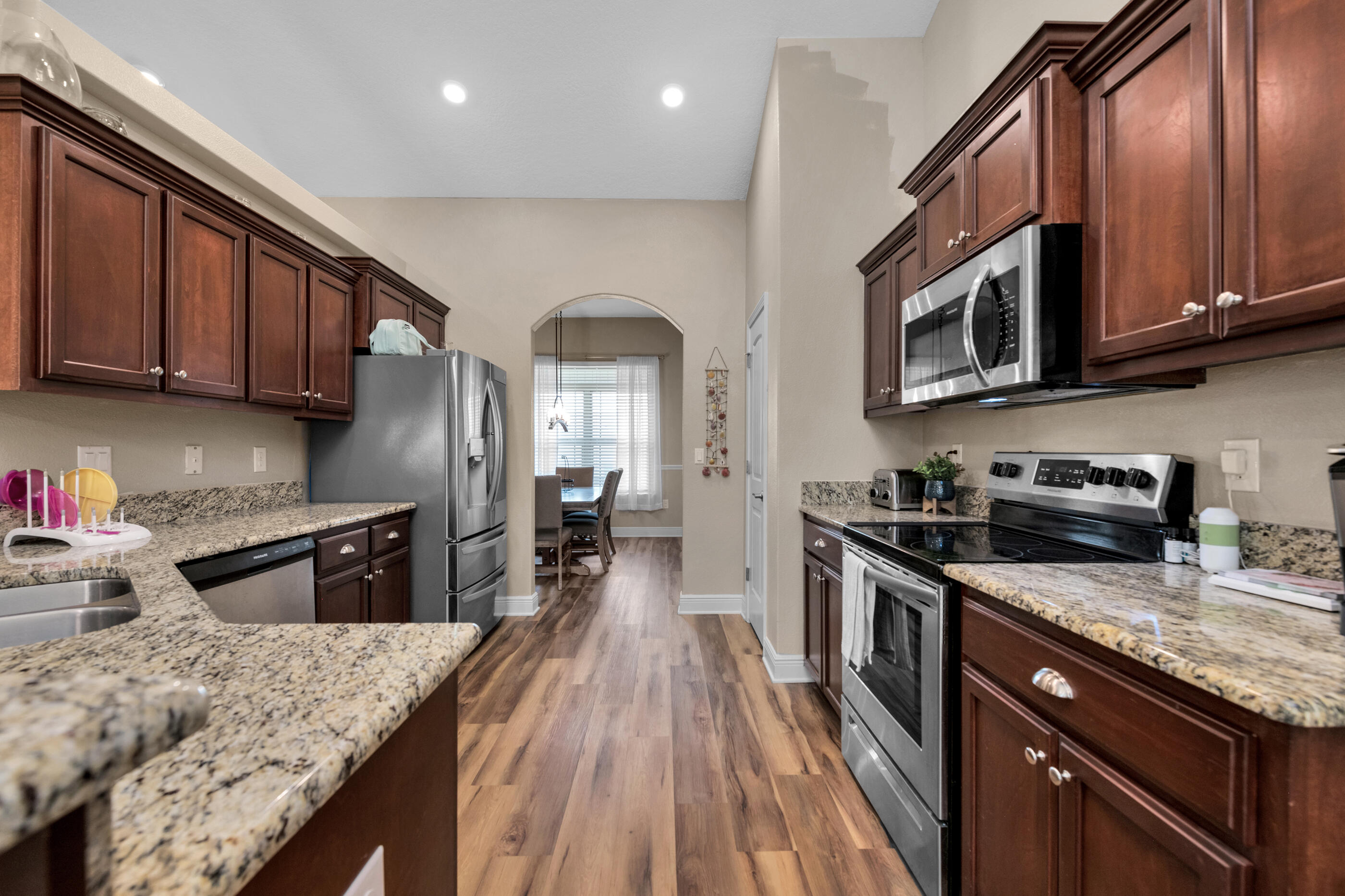 Like new, exquisite brick siding home built in 2019. This neighborhood is quaint and welcoming. Community pool and playground. For more info: http://www.willowcreek-hoa.org/The kitchen boasts granite counter tops, custom cabinets and stainless steel appliances. The floor plan is spacious and gives privacy with the split bedroom layout. The master bedroom opens up to the large covered back porch where you can enjoy long summer evenings. Don't forget about the large FENCED back yard (upgrade)! Big Bonus! Sellers say they usually pay $25 a month for their electric bill! This is huge when living in Florida!