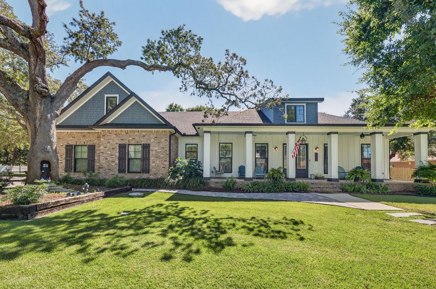 Welcome to this stunning 2019 custom-built Craftsman home, where timeless design meets modern luxury! Located within the exclusive gated community of Innerarity Island near Perdido Key, residents enjoy deeded water access, a park, kayak launch,  fishing spots, and basketball/pickleball courts. This immaculate 4-bedroom, 4-bath home (plus sunroom) offers an exceptional open floor plan with 16-foot ceilings, 8-foot doors, elegant crown molding, plantation shutters, and tile and LVP flooring throughout the main level. The kitchen is a true centerpiece, featuring a large quartz island, custom soft-close cabinetry, commercial-grade gas range, black slate appliances, a built-in Keurig refrigerator, and a spacious pantry. The breakfast nook adds charm and space with additional cabinetry and a w ine fridge. The living room impresses with a cathedral ceiling adorned with Cypress beams and built-in shelving, seamlessly connecting to a heated and cooled sunroom. The primary suite offers a private retreat tucked into a corner of the home and features a tray ceiling. Its en suite bathroom showcases dual vanities, a spacious tiled shower with a sleek linear drain, and two walk-in closets with custom wood shelving. The home boasts two true primary suites that offer ideal flexibility. Upstairs, a versatile landing area complements a bedroom and bonus room ideal for a 5th bedroom, theater, gym, or office. Also featured is an expansive laundry room with cabinetry and a mudroom area with extra storage near the interior garage entrance. The oversized three-car garage includes a dog bath, workbench, and ample storage. Outside, enjoy mature landscaping, a cozy fire pit, and room to add a pool. A 50-amp hookup accommodates RV parking, with space for a boat as well. Meticulously maintained and move-in ready.. This home blends thoughtful design, modern convenience, and superior craftsmanship, all in one of Pensacola's most desirable coastal communities!