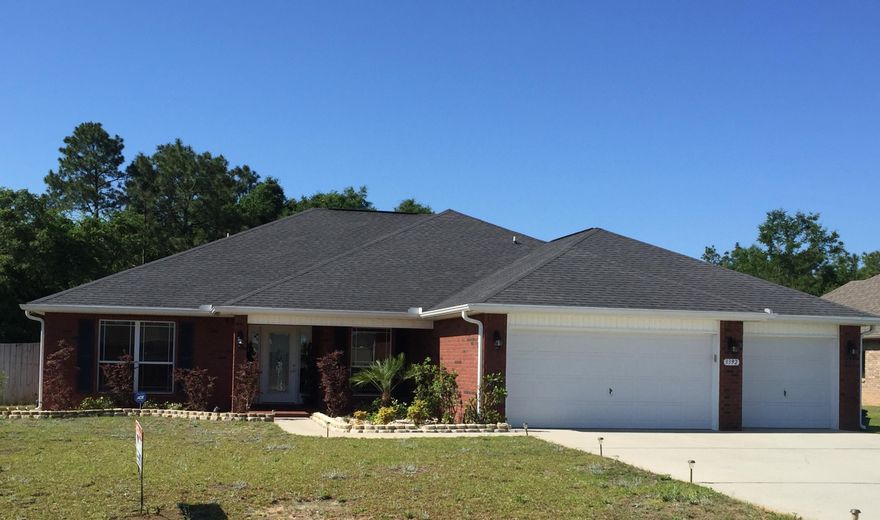 This spacious brick 4 bedroom, 3 bath home offers an awesome open split floor plan showcasing a formal dining with recessed lighting in niche, office with French doors, raised ceilings throughout and much more! This kitchen is open to the great room and features beautiful granite countertops & maple cabinets,stainless appliances, pantry plus a breakfast nook with bay window. Two bedrooms and a full bath off the nook, another full bath and bedroom off the kitchen... And a beautiful master suite with trey ceiling, two walk in closets, garden tub, separate shower, double vanities and a make up area! Covered porches on front and back of house, three car garage, yard building and LARGE level fenced yard!