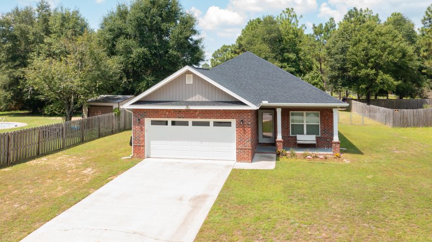 Practically new home with a large backyard and modern upgrades throughout. This beautifully maintained 3-bedroom, 2-bath property, built in 2020, is designed for today's lifestyle and comes fully move-in ready with thoughtful features that add both comfort and convenience.Step inside to an open layout with a neutral color palette and durable LVP flooring throughout. The kitchen is a true centerpiece with crisp white cabinetry, granite countertops, and stainless steel appliances. The spacious primary suite offers a private retreat, while two guest bedrooms provide plenty of room for family or visitors, each outfitted with ceiling fans.This home has been enhanced with custom blinds, an irrigation system, and a large fenced backyard that's perfect for kids, pets, or weekend gatherings. Both the front and rear porches are covered, giving you inviting spaces to relax or entertain year-round. Plus, the fridge, washer, and dryer are includedmaking the move-in process seamless.

Call to schedule your showing today.