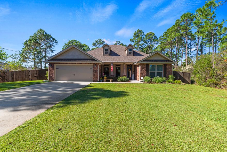 GORGEOUS POOL HOME ON OVER HALF ACRE! THIS 2018 FLYNN BUILT 4 BR/2 BATH HOME IS IN IMMACULATE CONDITION. NEW (DEC. 2023) SALTWATER GUNITE SWIMMING POOL BOASTS A HEATER, SITTING LEDGE W/SPA JETS, TWO PUMPS, CORDLESS VACUUM, APP CONTROLLED LED LIGHTING FEATURES AND FULLY SCREENED (2024). Surrounded by natural greenbelt areas gives this home a private oasis feel. KITCHEN has custom staggered cabinetry, granite counters, Island sink bar with room for 4 stools, Upgraded SS appliances, Smooth top range w/double ovens, wall pot filler faucet & soft close dovetail drawers. Sunny breakfast nook area has large window that overlooks the pool. Master BR has recessed ceiling w/fan. Master Bath is adorned with a custom tiled shower with seamless glass, rain head & wall head overlooking a soaking garden  tub complimented by tile surround and a deco frosted glass window with custom pull down cloth shade for light & privacy. A large walk through master closet also opens to the separate laundry room for convenience. Laundry room also has wall cabinets for extra storage. Bedrooms are spacious w/ceiling fans.
NOTABLE FEATURES: New 3.5 ton Rheem AC compressor. A .58 acre lot which includes a large buffered area on the north side that keeps the property very private. Full privacy fence - one side gives room for RV/boat parking through a large double gate. Tall recessed ceiling in Living Room. Wood plank tile flooring. Curved archways. Decorative inset tiled wall. Covered front & back porches. Gutters w/professionally installed leaf filters. Large energy efficient hybrid water heater, app controlled irrigation system w/well pump & Fabric shield hurricane panels. Membership in HBTS HOA includes: Access to Multi Million $$ rec center - 8 Clay Tennis Courts, Beach House (Event Hall), Fishing dock, RV/Tent Campground, 10 RV (Back Ins) - 6 Tent Sites, Lap Pool, Family Pool, Baby Pool, Full Weight Room and Cardio, Men/Women Locker rooms, Volleyball Court, Ball Field, Basketball Court, Boat Launch (East Bay) & more!

This is a GEM! Call to see today!
