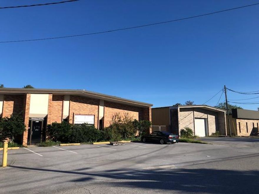 Existing freestanding office / warehouse building with small attached fenced yard space.  This property is located in NE Fort Walton Beach just off of Racetrack Road along Skipper Avenue. Access to Racetrack Road is controlled via traffic signal. The property sits along a quiet street with other light industrial uses.  This property has approximately 1200 SF office space and large open warehouse space with 4 large roll up doors that are covered by an awning.  Good parking available in the front of the building as well as the north side.  Rental rate structure $7.50/SF base rent + $1.00/SF NN fees + sales tax = $8590 per month.