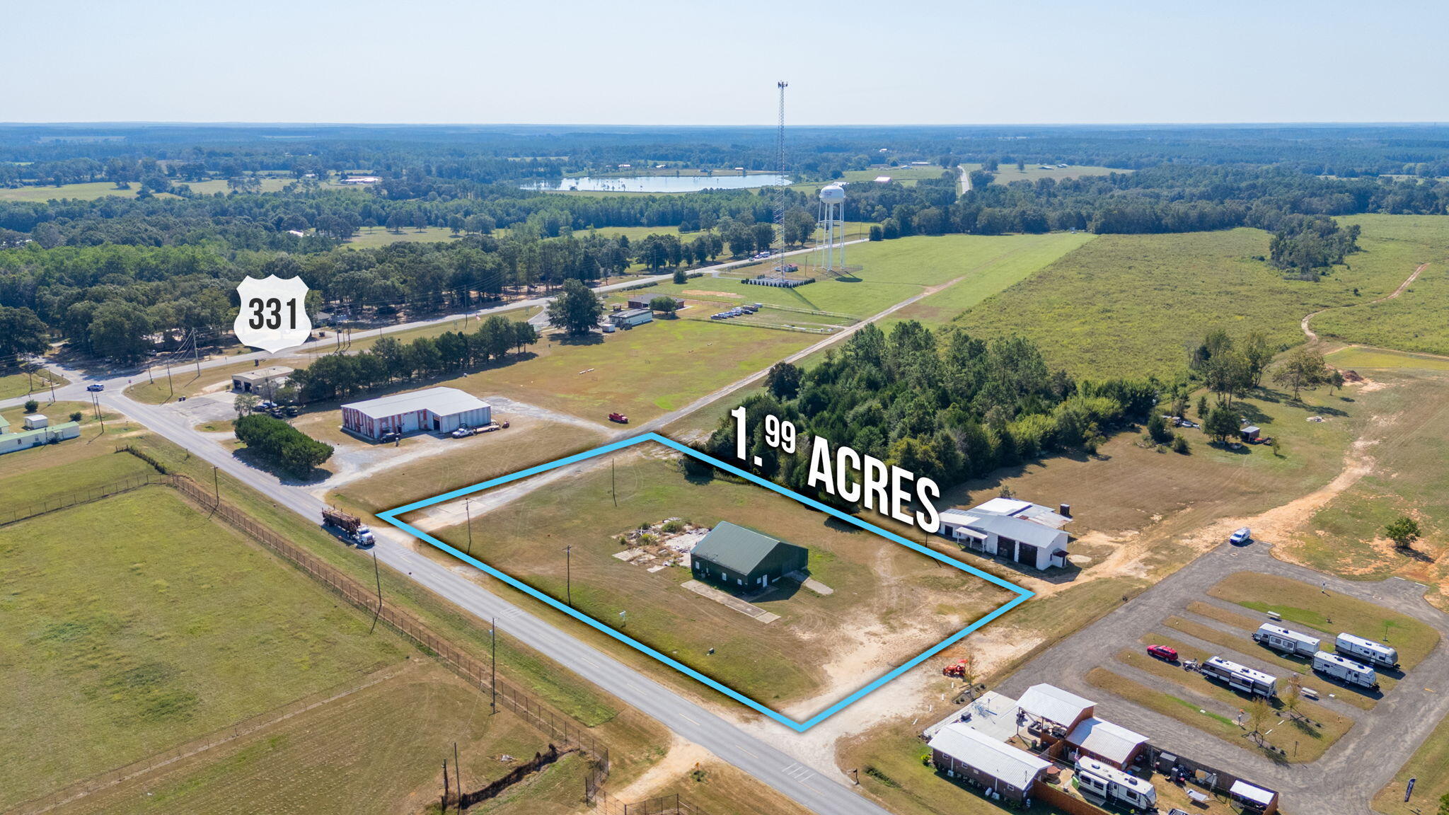 Located central to the Paxton Industrial Park this 1.99 acre location offering a 2695 sqft office warehouse offers tons of protentional and opportunity to turn your business into a reality. Zoned Industrial - building offers office spaces, warehouse storage and a large lot all on paved road frontage. All due diligence is responsibility of buyer to include land use availability to suit business and requirements from City.