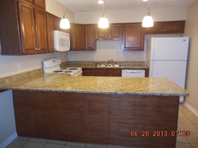 Centrally located townhome that has been remodeled. 2 bedroom 1.5 bath and an end unit. Newer kitchen cabinets, countertops and appliances. We do NOT accept PETS in this unit and no smoking is allowed in the home. Privacy fenced back yard.