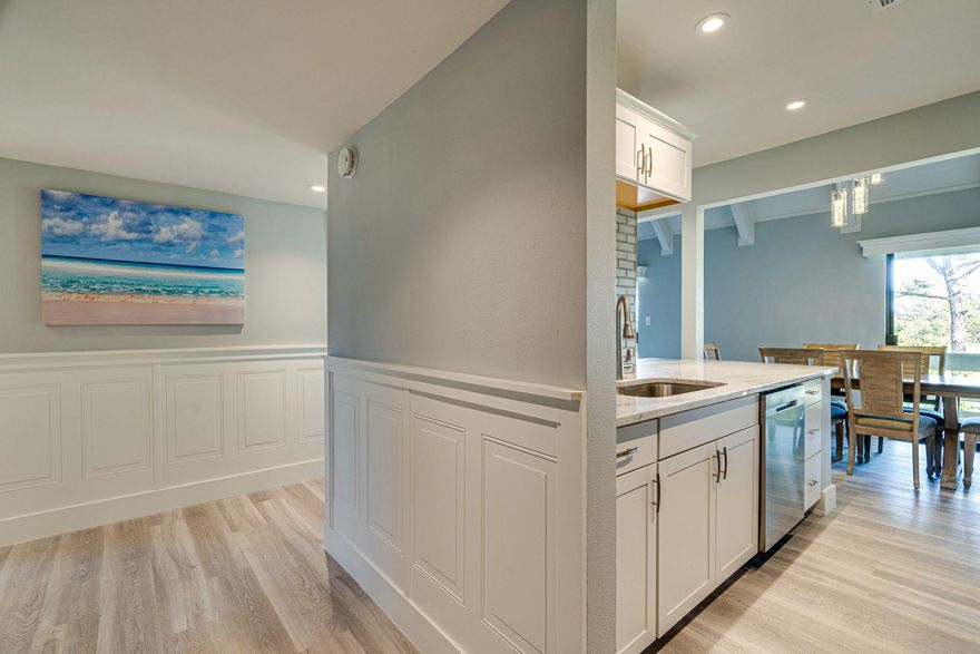 A must see Top Floor in Seascape Condo Garden Villas! Beautifully remodeled - an ELEGANT 2 bedroom getaway with golf course views. NEW Full size Washer/Dryer. NEW SS Appliances. NEW Luxury Vinyl Plank Flooring. NEW cabinets and Carrera Marble countertops in kitchen and baths w/custom Shower Glass Doors. NEW LED Recessed Lights, NEW Interior Doors, NEW Wainscoating in hallways, NEW Beadboard on Vaulted Ceiling in Living Area. ~ Prior (2018)-Roof, (2005)-HVAC Interior and Hot Water Heater, (2017)-both mattress sets, both sofas and dining furniture. Short-term rentals allowed.