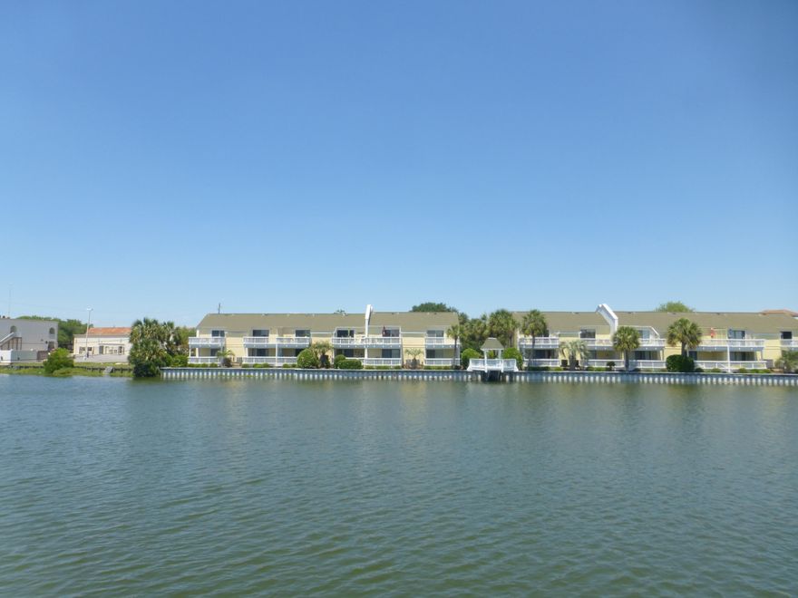 Outstanding 2Br., 2.5 Ba. with an awesome view of the Lake, at the same time you are just steps to the Beach, Pool and Tennis courts. Many upgrades. New flooring, tile on diagonal, All new raised paneled doors, New lighting New A/C, Bead board through-out. New kitchen - cabinets, granite, New sink, faucets, appliances, New bathrooms, Wood ceiling in the kitchen. Decorator designed. Turn key. There is an overwhelming sense of relaxation when you are here in this spacious retreat. Two Decks off the Master bedroom & one off the living room. A must see to appreciate all the details that were put into the remodel of this cheerful beach Property. Buyer to verify all room dimensions & Ma. fees.