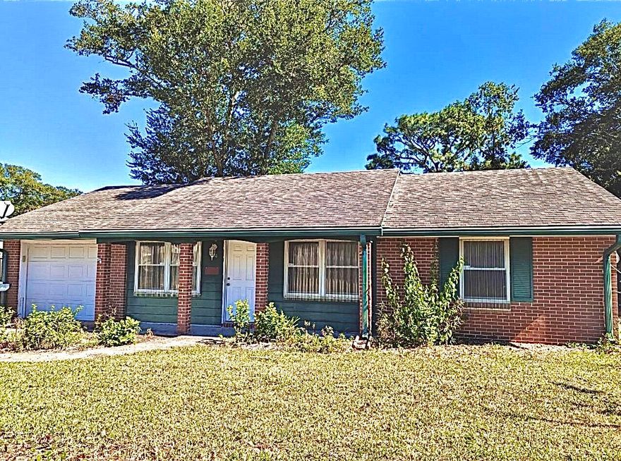 Great brick home in a central location. WONDERFUL back yard with fruit trees!  It is a FIXER as to qualify for insurance, it will need a new roof and electric, which are the responsibility of the buyer.  Quotes are being obtained on both.  The seller will not pay for the roof and electric.  It will only be included in the price if the buyer's lender will agree for the repairs to be made immediately after closing as a holdback and the price is increased for pay for the roof and electric.