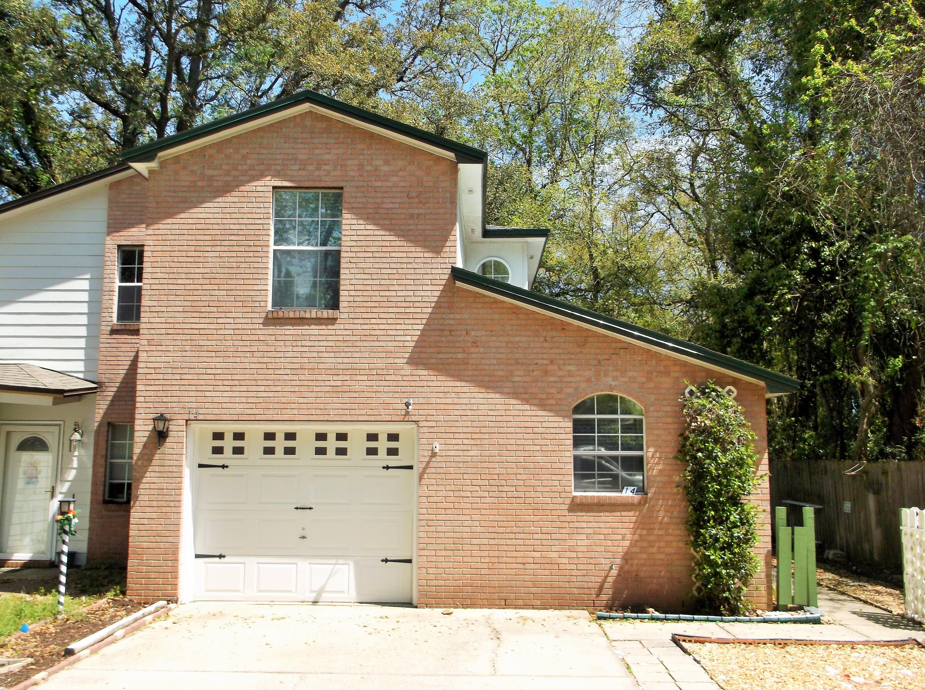 3 Bedroom townhome with Primary bedroom on 1st floor with doors wide enough for wheelchair access.  Cozy Living room with Fireplace.  End unit with extra parking possibilities & little side yard for your pet. Roof 2015; new AC in 2024 & HWH.