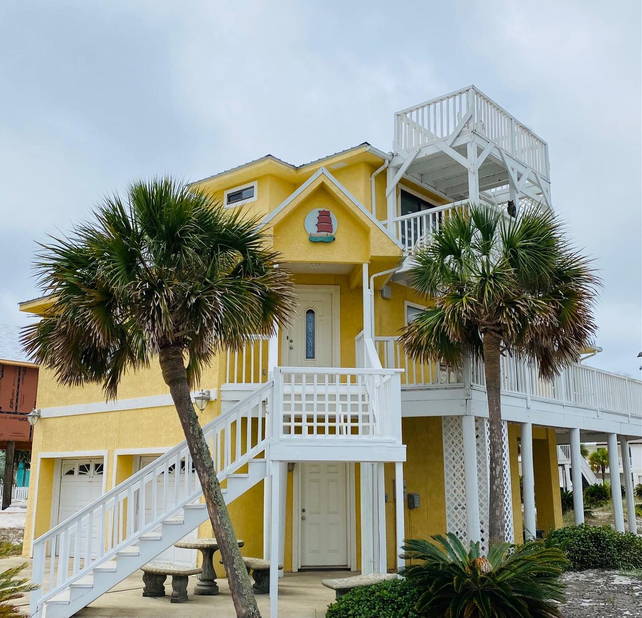 RARE FIND. Beach home in quaint neighborhood with neighborhood pool and deeded sound access with dock. Easy walk to the Gulf. Can be used as a short term rental up to 6 people. Sold furnished. Balconies with great beach views. Buyer to verify all measurements. More pictures coming soon.