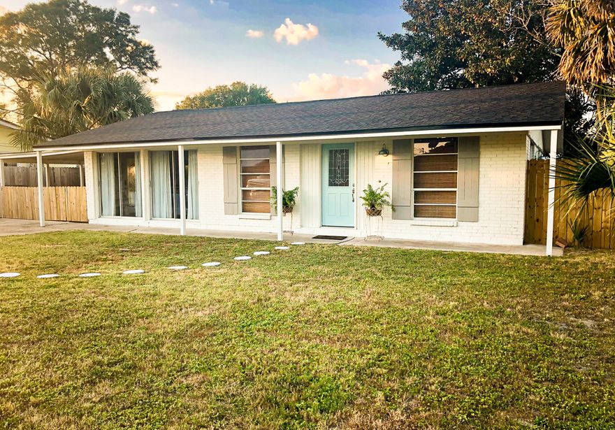 This charming 4 bedroom ranch is located just a few blocks off the Gulf in the popular Open Sands neighborhood. You can enjoy ocean breezes from the covered patio, or a game of catch, or cornhole with the family in your large fenced-in backyard...there is even room for a pool!You'll notice fresh paint inside and out in modern coastal colors, a new roof and fencing. Interior features include bamboo flooring, updated appliances and lighting, and vaulted ceilings create a spacious feel throughout all the main living areas. The 4th bedroom located off the kitchen makes a great bonus room or guest bedroom, and it has its own full bath and separate entrance! The home comes with a small shed off the patio perfect for all of your beach gear, and a large 10'x24' storage building offering ample