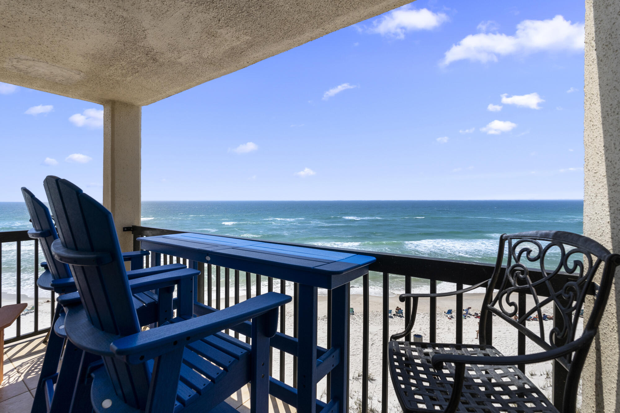 GREAT NEW PRICE! Rare corner unit on the 5th floor of Pinnacle Port's B-1 building! This spacious 3BR/3BA condo features an open floor plan, updated rooms, and tons of natural light. Each bedroom has its own private bath, perfect for comfort and privacy. Enjoy sweeping views of the Gulf and Lake Powell from the wraparound porch. Located in a 25+ acre gated community, Pinnacle Port offers resort-style amenities: two pools, tennis courts, shuffleboard, gym, picnic area, and a dock with boat ramp access. With over a quarter mile of beach frontage, this is more than just a home--it's a lifestyle. Ideal for a full-time residence or dreamy vacation escape!