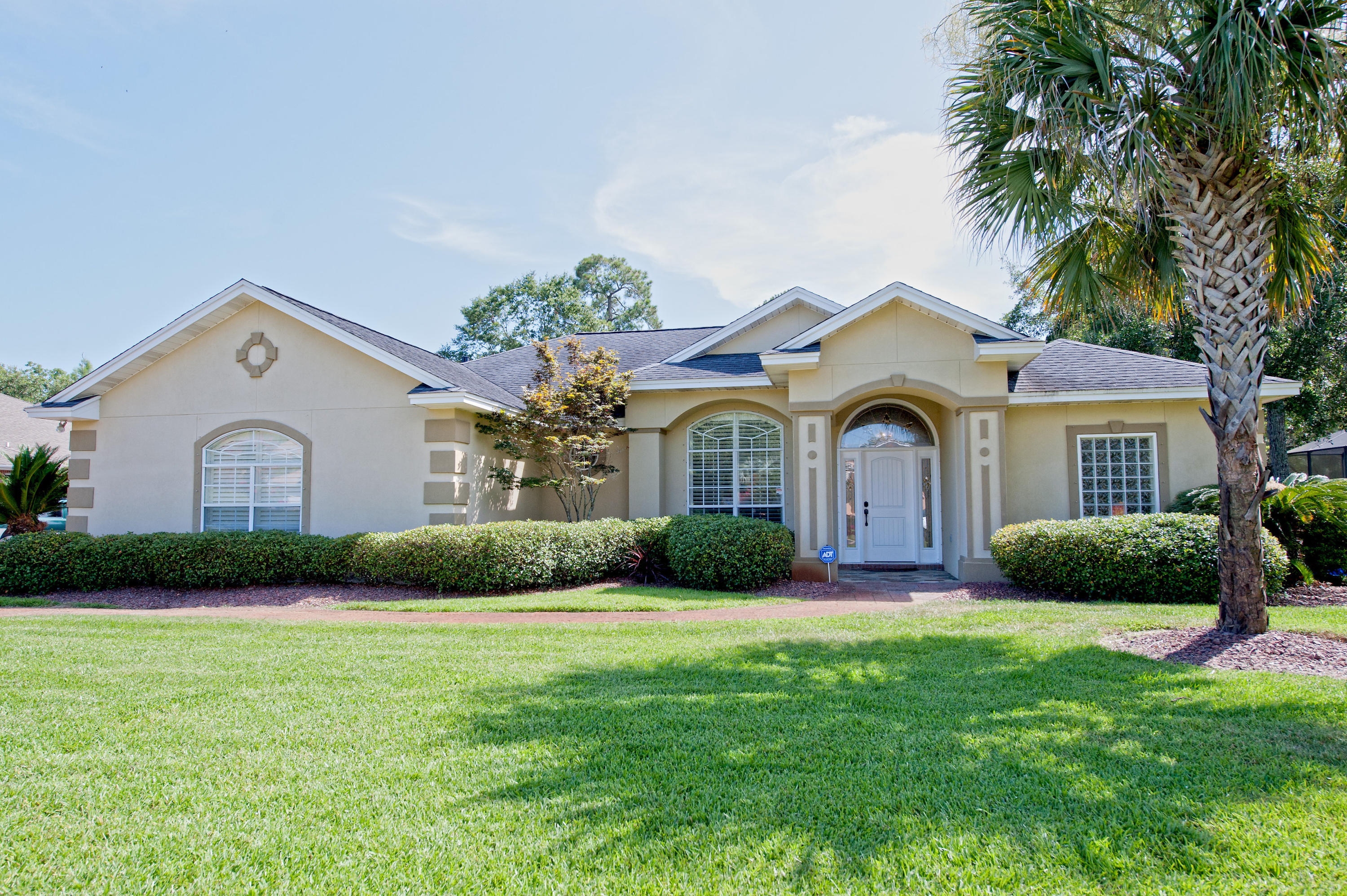 Gorgeous upgraded home in Bluewater Bay. Home Warranty, Stainless Steel Kenmore Elite appliances, Granite counter tops, Copper fixtures, LED Recessed lighting, Gas fireplace, Nest thermostat, Ceramic tinted windows, Plantation shutters, Rinnai tank-less water heater, Built in bookshelf,Enclosed pool,Dog playgroundThis home is conveniently located in Glenlake, one of the finest subdivisions in Bluewater Bay. You will be impressed with all the extensive upgrades. 3000Sqft of paver driveway and walkway leads to the stone laid entrance or two car garage. As you open the door you are greeted with a fabulous view of the foyer and dining room with a built in bookshelf and ground outlets. Attached to the dining room is the office furnished with a custom-built in granite desk for two.