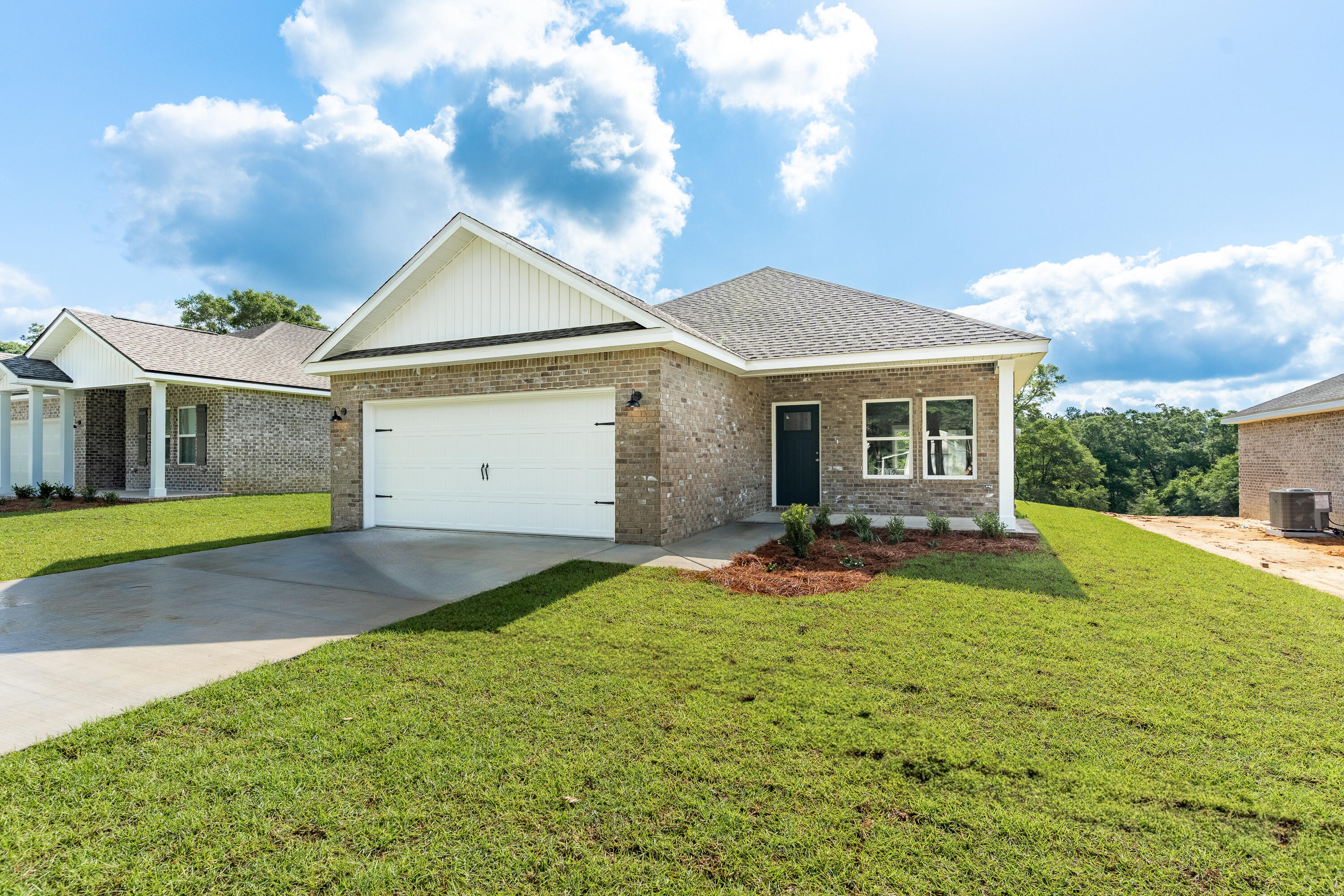 4TH OF JULY SPECIAL - FREE BLINDS, REFRIGERATOR, WASHER/DRYER & $10K TOWARDS CLOSING COSTS (restrictions apply). ''FRANKLIN'' FLOOR PLAN will be ready in late July - Still time to make some selections. Welcome to SOUTHERN DAY CHATEAU S/D IN BAKER FLORIDA! This all-brick home features raised ceilings, recessed lighting, ceiling fans thru-out, luxury vinyl plank flooring, granite or quartz countertops, sprinkler system for the beautiful, landscaped yard. Front and rear porches for relaxing. Kitchen has white shaker style cabinets, work island w/bar seating, cozy dining area, pantry and stainless-steel appliances. Owner's bath has walk-in closet, double vanities, shower only. Photo of similar completed home, interior/exterior colors will vary, front elevation may vary.