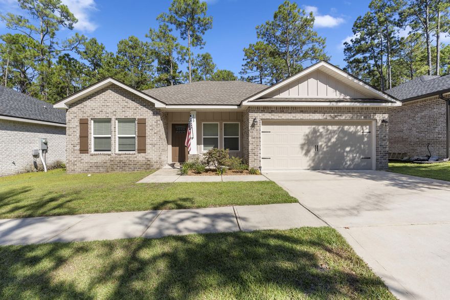 Thoughtfully designed semi custom home that offers a full brick exterior and maximizes the space well due to its open floor plan. It offers 10 foot ceilings, crown molding on the cabinets, large kitchen quartz island and recess lightning throughout the home. The large windows allow for tons of natural lightning which helps the home feel bigger and connected with each room. The master bedroom has privacy, dual vanity quartz sinks, a glass shower and a large walk in closet. The other 2 bedrooms offer high ceilings and generous size closets. As you walk out to the backyard, you will notice a greenhouse to grow your own food, fenced backyard and patio to enjoy a nice coffee or sunset. This home offers convenience and high quality finishes for overall low maintenance.