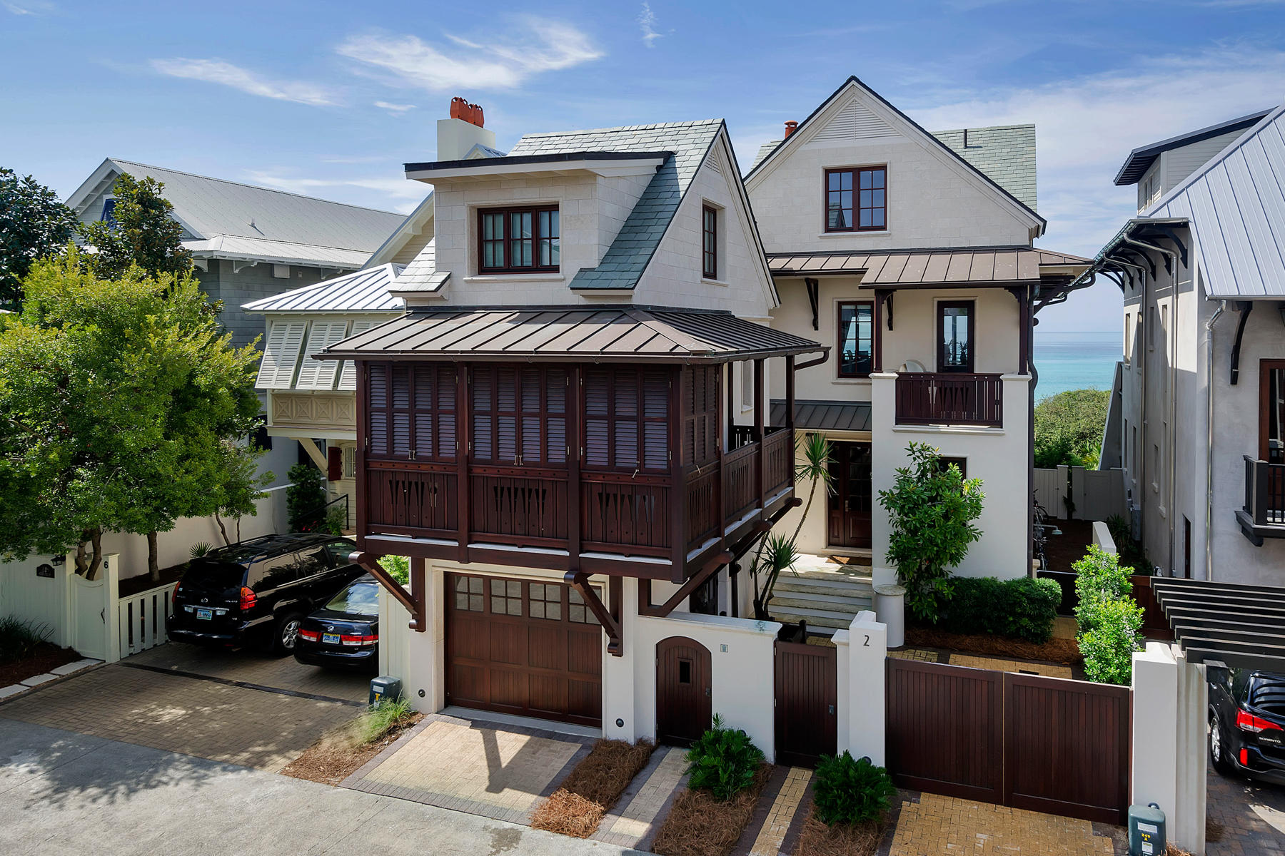 GULF FRONT, GULF FRONT, GULF FRONT! CLASSIC GULF FRONT IN ROSEMARY BEACH: This Main & Carriage House incorporate Quality & Style with a West Indies motif. Level 2 of the Main House hosts the open Living/Dining/Kitchen to take advantage of the Panoramic Views of the Gulf. Level 3 enjoys a spacious Master Suite with Private Living Room and Balcony. Level 1 features 2 Guest Rooms with ensuite Baths and a Bunkroom.The Carriage House was designed as an Independent Guest Suite with a Living Area, Galley Kitchen, half Bath downstairs and Lofted Bedroom with full bath upstairs.