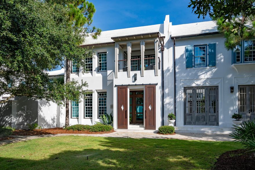 Welcome to Alys Beach's Arboleda Park and the highly sought after home offering of 32 Spice Berry Alley.  This masterful design created by Fouquet' Architecture solidifies elegance & sophistication intertwined to the beautiful entry setting on the famed Arboleda Park.32 Spice Berry Alley creates intrigue & allure upon access framed by the stained mahogany entry slider doors giving way to the glass entry stoop. Architectural detail is noticed immediately upon entering the concrete cast zaguan providing a glimpse of what's yet to come.This 3 bedroom, 3.5 bath home plus bunk room additionally yields a 2nd common area space for a separate retreat.  Pets are considered in design with a built-in kennel for those loved ones.  The 1st floor living captivates one immediately with open vistas of the living & dining rooms and the custom kitchen outfitted with Sub-Zero & Wolf appliances.  
Sightlines of the interior spaces are illuminated by the architectural design of the courtyard that provides natural light & beauty to these spoken interior spaces.  Courtyard living is an extension of your indoor amenities.  The aesthetics of pristine landscaping, decorated fountain wall, and fire pit surrounded by seating with summer kitchen create a favorable ambiance for outdoor entertaining.  
The custom designed kitchen hosts marbled quartz with leathered ebony natural stone on a multi-level island, modern wood grained cabinetry trimmed with a thick ebony accent. The upper cabinets are full overlay complimenting the Sub-Zero refrigerator and the Wolf range. Ascending to the second level leads you to an additional living/media room with adjacent custom bunks. Two junior primary suites flank the media room with ensuite private bathrooms each showcasing their own custom decor. 
The primary suite boasts an opulent entry hall with clear glass floor transoms accentuated by flowing natural light which overlooks the courtyard below. The truly unique details for this special home lie in the elegant primary suite accented with walnut floors and vaulted walnut ceiling. The spacious and exceptional primary bathroom invites you to separate double vanities, stand-alone soaking tub with separate Carrera marble shower. A separate make-up vanity was thoughtfully placed prior to entering the extremely generous custom designed master closet capable for full time living. Begin the morning or end the evening by sitting on the private terrace overlooking Arboleda Park.  
32 Spice Berry Alley is strategically located near The Caliza Pool, Zuma Wellness Center, and Town Center.  The private owners Beach Club access conveys with the purchase of this magnificent home.  This property is a must see.   
