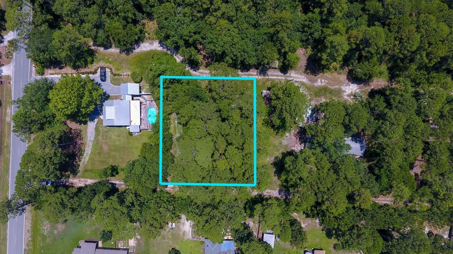 LOCATION! LOCATION! LOCATION! This high and dry half acre lot is tucked away on the private road Grantham Lane just off of Mussett Bayou Rd....conveniently located in the heart of West Santa Rosa Beach and a half mile from two popular restaurants Louis Louis and VKI.... Ten minute drive to beaches, public boat launches, entertainment, shopping, restaurants.  Lot size would be ideal for a  large 1 or 2 story house  along with plenty of room for  3 car garage, boat parking, RV etc.   This lot would accommodate many options for a residential home.