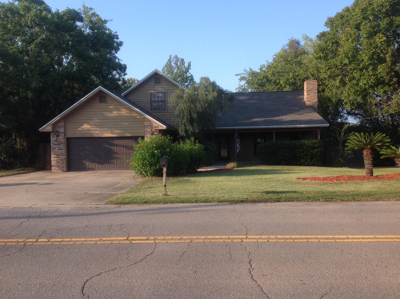 SELLER MOTIVATED! Desirable Kell-Aire Gardens Subdivision. LAKEFRONT HOME OFF MAIN STREET DESTIN. DOUBLE CORNER LOT! COUNTY HAS SAID CAN SPLIT THE LOTS UP FOR A POSSIBLE TWO HOUSES. BUILDERS GREAT OPPORTUNITY! Curb appeal and ample parking greets you as you arrive. Main living space features cathedral ceilings, to-the-ceiling brick fireplace, wood accents and has an inviting open concept layout. Kitchen with both eat-in and formal dining space offered. Stainless fridge, stainless gas range, stainless dishwasher and stainless built in microwave! Majestic views of the Lake from Master, upstairs bedroom, Florida room, Hot Tub and Pool. Decking across the entire back of the home. Manicured lawn with in-ground pool and Hot Tub! Dock with boat parking.