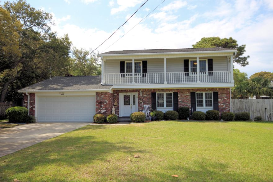 Beautiful and spacious family home situated on a large lot in Lake Lorraine Subdivision. Kitchen has granite counter tops, and decorative tile backsplash. Family room has a fireplace, mantle and french doors leading out to the 51x17 screened in porch. This property is great for families and for entertaining. The yard is absolutely amazing!! 36x16 in-ground pool surrounded by a safety fence. Beautiful landscaped backyard with lots of privacy and a side yard for children to play. Large workshop 18x14 with electricity, AC window unit and pull down stairs for extra storage. Double gate in the backyard from 12th Avenue for boat, RV, or additional parking. Customized outdoor shower with hot/cold water. Don't miss out on this incredible property. Schedule a viewing today!!