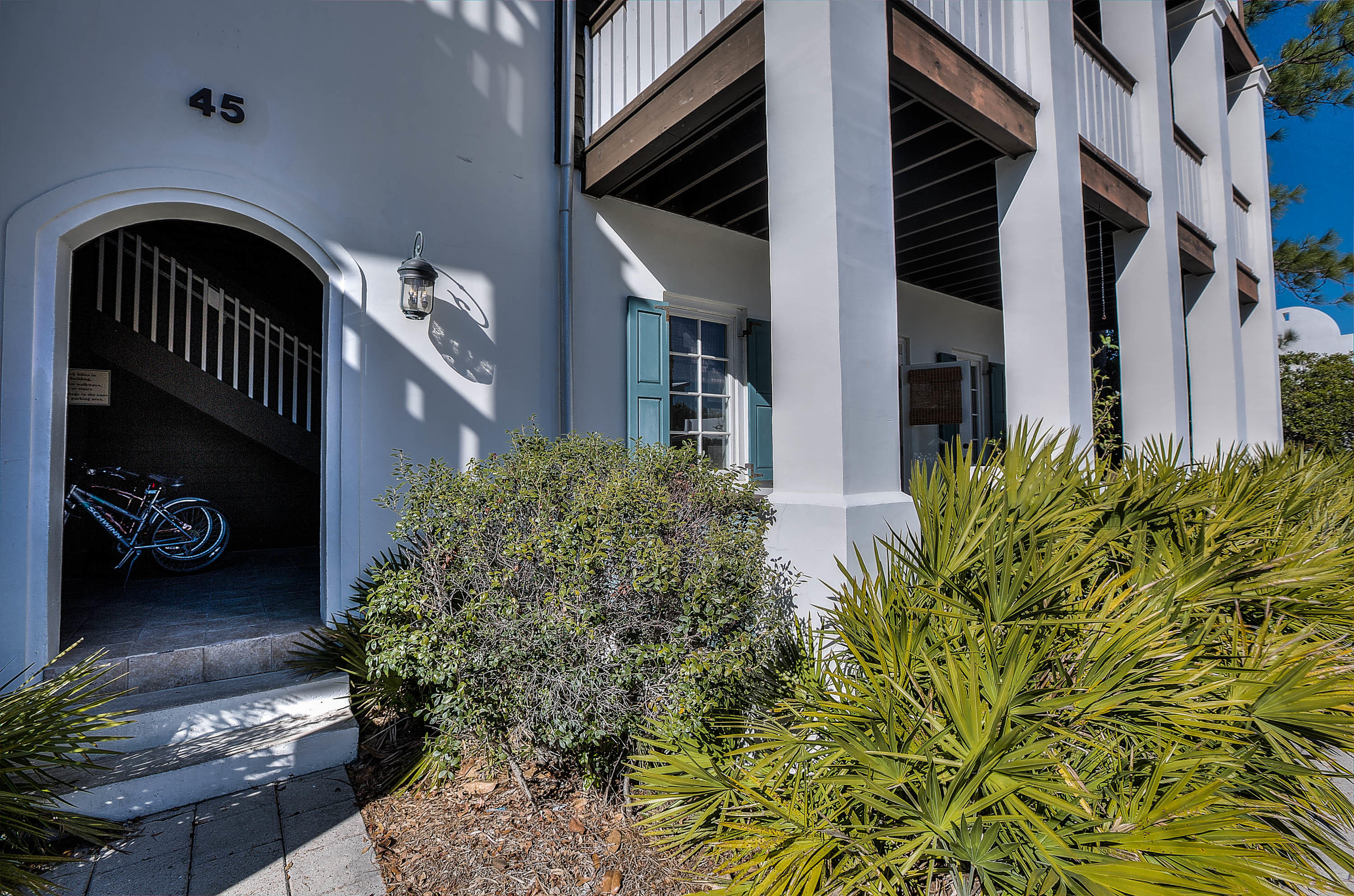 A rare find in Rosemary Beach. One of the few flats with built in hallway bunks. This 2 bedroom 2 bath unit has a large wrap around porch. Located on the ground level. New hardwood floors, newly painted. This immaculate property has never been rented but will enjoy great rentals for a new buyer. Unit located in close proximity to all amenities including the new RMB pool amphitheater complex. Unit being sold furnished with some exclusions