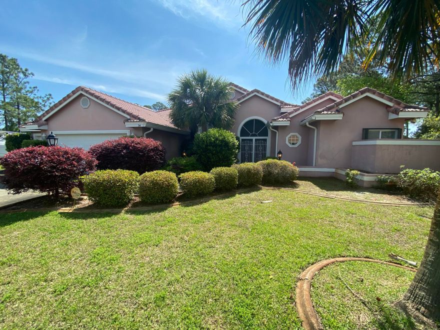 This home is right in the heart of Miramar Beach.  Golf cart to the beach and access Legion Park boat ramp without getting on hwy 98.  The home was built on 2 lots and has a 3rd lot that conveys with the property.  It is being sold as one parcel.  Screened in Swimming Pool with fountain, Large 2.5 Car Garage, 15 foot ceilings throughout the home!  The property even has a second driveway perfect for an RV or Boat.  NO HOA!!!! Great shopping and Restaurants nearby.  All one level living.  This home has excellent remodeling potential.  Perfect for primary residences or an investment property.