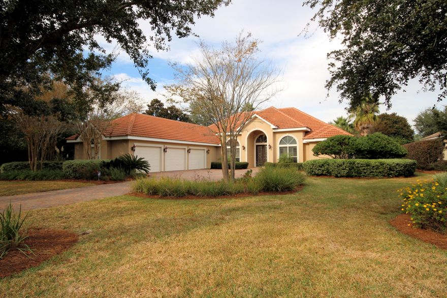 Exquisite, Executive home located in Kelly Plantation on a non-flood zone area, and on one of the larger lots in Kelly Plantation. Home offers an impressive sized and elegantly landscaped yard with an over-sized brick paved driveway with large courtyard entry area and 3 car garage. Upon entering this home, you are welcomed by the spacious foyer which opens into the great room. Great room is flanked by a gas fireplace, 14 foot ceilings, crown molding and opens onto the Screen pool and lanai area which is (50x28). Gourmet kitchen will please any cook with 13 foot breakfast bar, spacious nook, granite countertops, custom cabinets, stainless steel appliances, with double ovens, Electric cook top, wine fridge and much more. Seller has renovated all the bathrooms, including the Master bath.