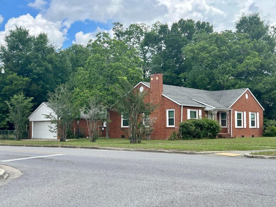 Downtown DeFuniak historic home/duplex just 2 blocks to Lake DeFuniak. Easy biking or walking to parks and downtown amenities like shopping, dining and the weekly farmer's market. Lovingly renovated 2 bed/2.5 bath/2 car gar mixing the old and the new. Newly refinished hardwood floors (no pets please) throughout. The kitchen includes a pantry and room for an island. Dining room with built in cabinets can double as an office or other needed space. Living room is roomy with a fireplace as the focal point. Rooms are light and bright. The master suite & kitchen features shiplap walls uncovered in the renovation. Mater bath is all new with large tile shower and double vanity. The exterior will be updated with new paint, etc as well as a new courtyard patio.