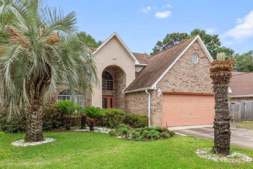 Step into this beautifully upgraded 4-bedroom, 3-bath home featuring an open-concept layout with soaring cathedral ceilings, travertine marble floors, and a downstairs guest suite. The chef's kitchen boasts solid wood cabinetry and overlooks the inviting living and dining areas, perfect for entertaining.Relax in the private backyard oasis complete with a screened lanai and sparkling pool. The luxurious primary suite offers a large soaking tub and plenty of space to unwind.Nestled in a peaceful, walkable community just minutes from the water, this home is ideally located only 5 minutes from Eglin AFB's main gate and just 3 minutes from the area's premier marina with boat dry storage. Whether you're into boating, biking, or simply enjoying the Florida lifestyle!