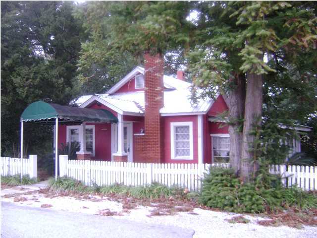 Commercial property with many uses - zoned C-2. Previously used as a restaurant and a retail store. Zoning allows for all types of retail, service and repair shops including discount and auction houses. Sale includes adjoining paved parking lot and land behind building and lot. Parcel numbers are provided in legal. Building has 3 separate areas for dining and display plus office area. 3 baths, including handicapped. 2 water heaters. 2 central heat and cool units. Also has a basement area that previously was a ''pizza kitchen''. Fireplace(closed)in the entrance area. Oak and Ceramic tile flooring. 2 new gas water heaters have recently been installed. Building is handicap accessible from parking lot into building. Sold as-is.