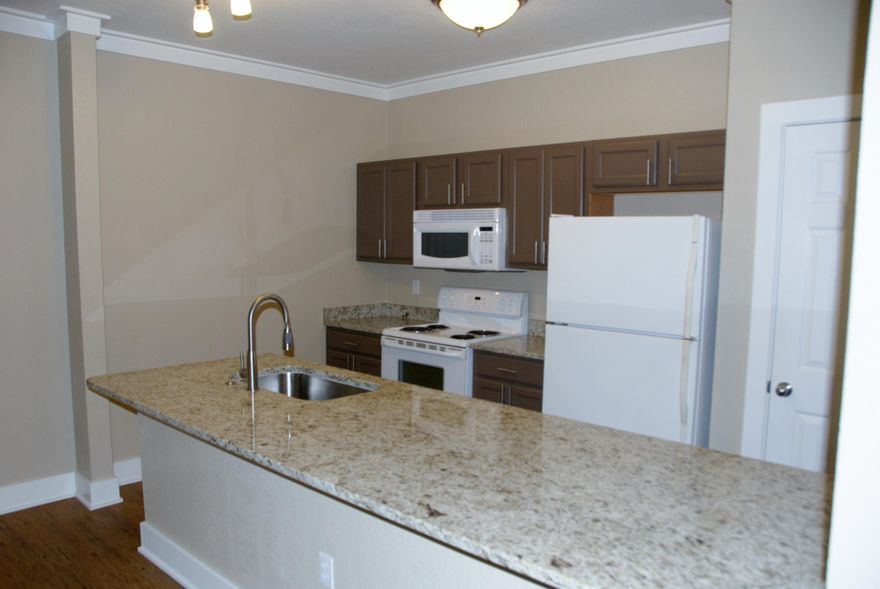 TONS OF UPGRADES & CRISPY CLEAN! Come see the many well-thought upgrades that set this unit apart from all the rest. Pergo wood flooring and fresh paint throughout. Kitchen has been remodeled with granite countertops; new light fixtures and eat-in seating space added to breakfast bar.Master bath remodeled with custom, glass enclosure shower and granite vanity top new sink; lighting; mirror and fixtures. Additional closet space added to master bedroom. New washer; dryer and water heater. Back patio extended with privacy fencing. Garage has custom storage cabinets and workbench. Master Bedroom and Living Room are rewired for wall mounted flat screen TVs. Close and convenient to everything in Destin. See attached Upgrades List.