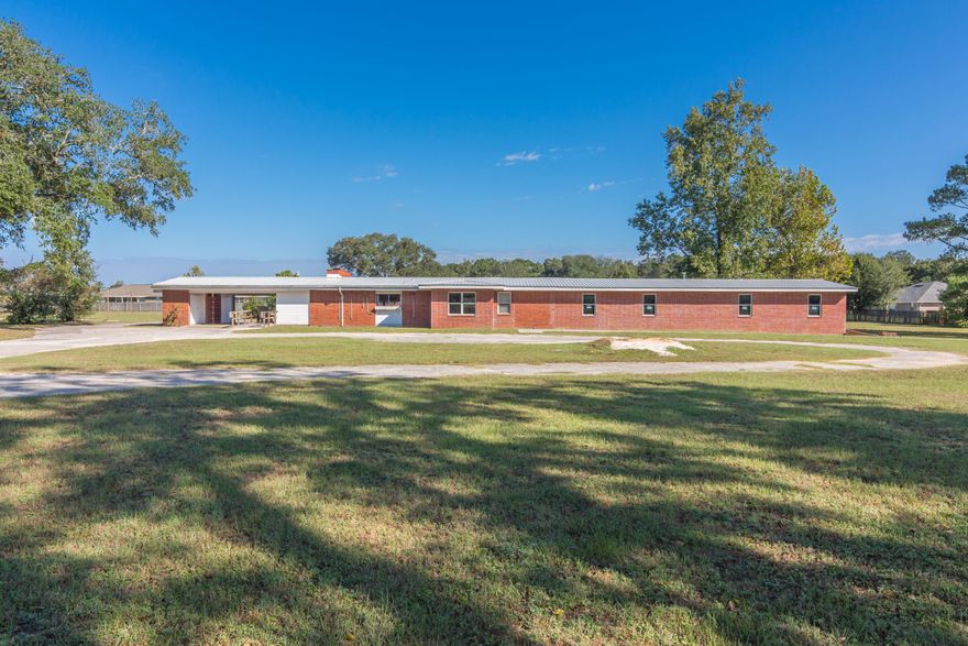 Beautiful vintage country property on 3.38 acres. Once the home of the Lee family, this house has been kept in pristine condition. It has been updated to meet current code requirements and served as an Assisted Living Home for just over a year. Great care has been taken to preserve the homes history. A new wing has been added to expand the home to 9 bedrooms and 7 full baths and is near completion. The home is ADA compliant complete with handicap fixtures, a fire sprinkler system, and fire alarms. Many extra amenities include: a laundry room with half bath, fireplace in the living room, large shower room in the rear hall, and fully enclosed screened in back porch. Property boasts many extras such as a raised garden bed, fenced in yard, gated drive,