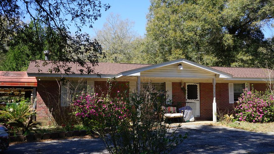 Say goodbye to cramped neighborhoods and hello to your own 1.25-acre slice of peace and quiet! This 3-bedroom, 2-bath home gives you 1,785 sqft of comfortable living space, perfect for relaxing and making memories without feeling crowded. Built in 1973, it rocks a sturdy shingle roof that's only 4 years young, an HVAC that still has plenty of chill left at just 8 years old, and an electric water heater updated within the last 6 years. Plus, the septic system was serviced just two months ago, giving you one less thing to worry about. No HOA means you call the shots. Flood insurance isn't required, so you'll keep more cash in your pocket. If you've been dreaming of breathing room, privacy, and the flexibility to do your own thing, you've found it. Come check it out before someone else stakes their claim!