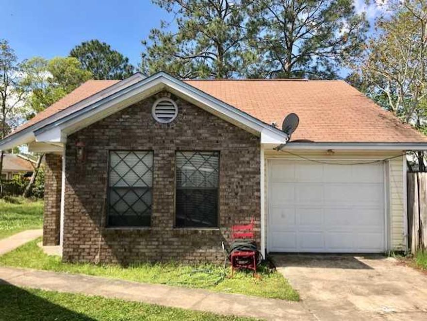 Great investment property close to back gate of Hurlburt! Kitchen remodel almost complete! Granite countertops, cherry cabinetry, stainless-steel appliances, tile flooring! Needs minor electrical work, painting, flooring, fence & wood repair. At end of cul-de-sac with large side & back yard! Laminate & tile flooring! Utility room! Two patios!