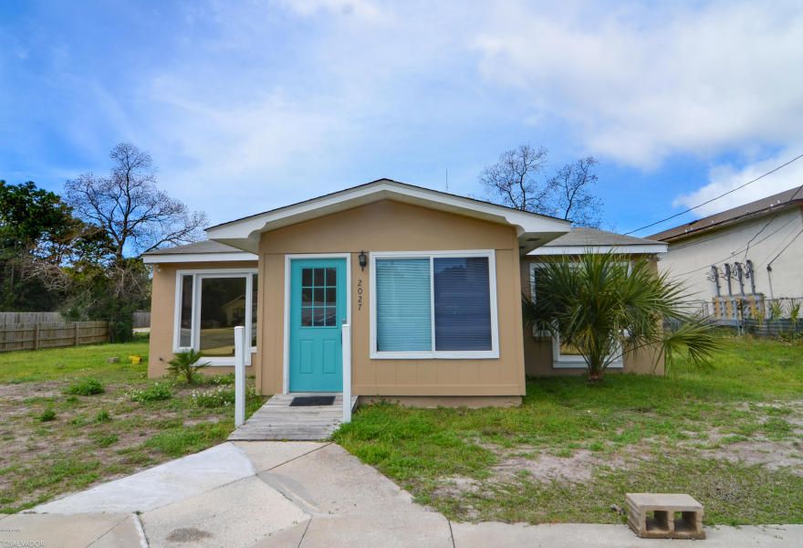 Great Location with high traffic count for excellent visibility on a huge 100x262 lot, 100 x 162 area of additional yard space behind the building. Ideal set up for a business that needs additional yard space for equipment,storage etc. The building itself is set up wisely with plenty of office space both open and private; a large eat-in kitchen area and a large handicap assessable restroom area. the building is naturally airing and bright. Another great feature is the easy parking set up. This property has a circular drive and additional driveway space. Some of the previous businesses from this property were a Taxi business; day care center. This is a prime location priced right!