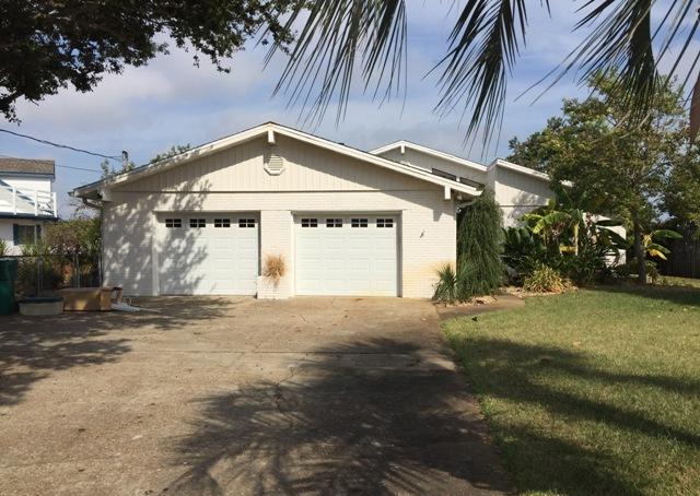 REO ~ Waterfront on Okaloosa Island! This 3 Bd / 2.5 Ba home is conveniently located on Okaloosa Island & offers incredible views of the inter-coastal waterway. The living room offers tons of natural light along with vaulted ceiling, fireplace & views. In addition to the living room there is a bonus room which would make a great office or extra living space. The outside of the home offers a spacious dock & white sandy beach area. Don't miss out on all this home has to offer.