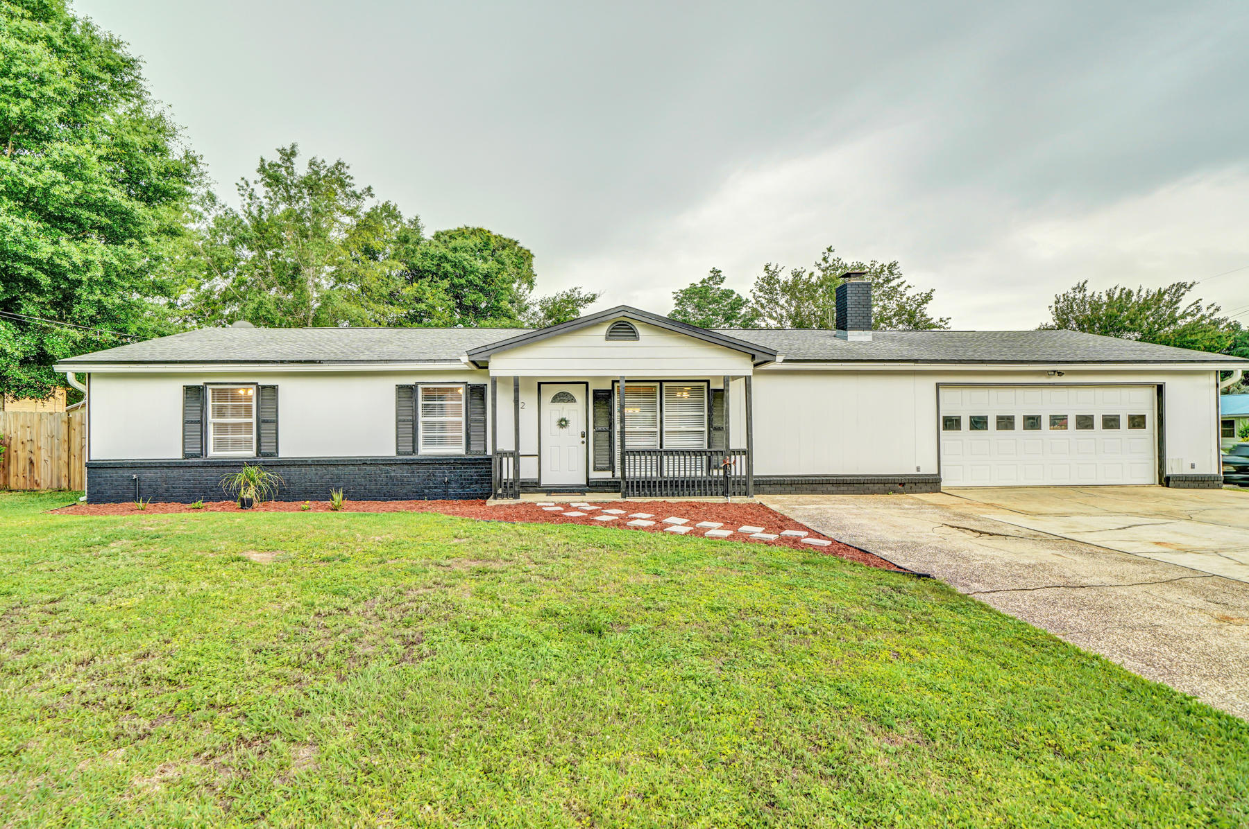 Do not miss out on this 3 bed/2 bath/1,537 sq ft home with an inground POOL and fenced-in backyard! With a fantastic location that is just minutes from Hurlburt, Eglin, and the beach, you will not be disappointed ~ You'll see the screened in back porch and mature palms by the pool in the large backyard, which can be accessed through the extended garage drive-through option (double door in the front and single door in the rear). Inside, you'll enjoy the gorgeously updated kitchen and bathrooms with their custom tilework. Other upgraded areas to note: stainless steel appliances, updated flooring, modern gray paint scheme, huge fireplace, and plenty more! *Seller is requesting a leaseback until July 8th.* Call now for a showing!