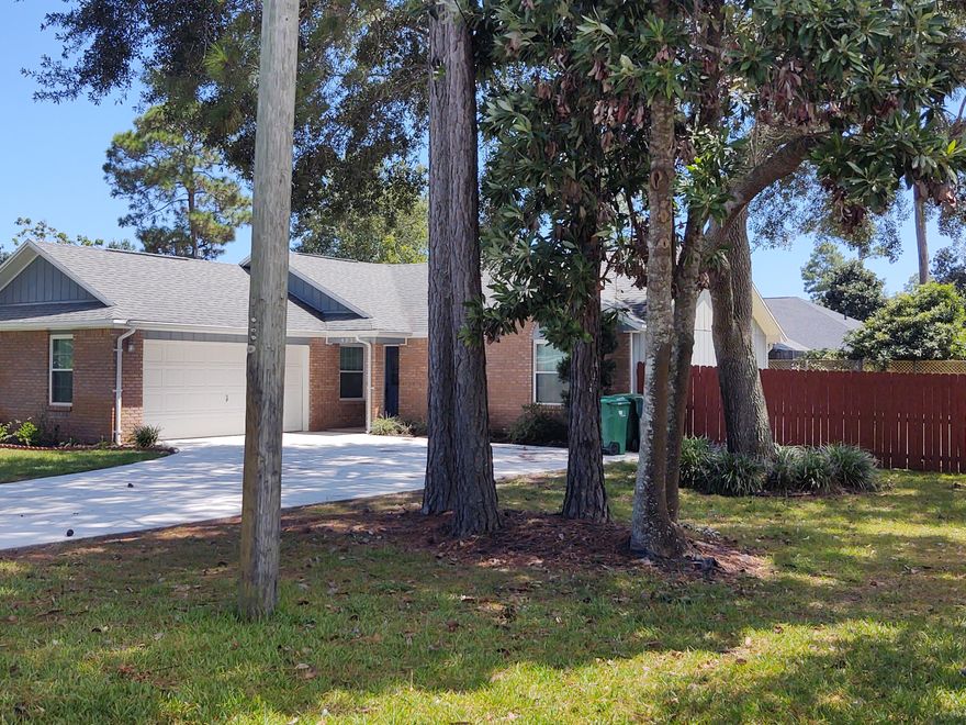 Available September 10, 2021 - Fantastic Niceville Location. Convenient to Eglin, Duke, Hurlburt and Destin's sugar white beaches. This 3 bedroom, 2 bath home offers new LVP flooring, and fresh paint completed August 2021. New Quartz kitchen counters with deco tile backsplash. When quiet time is needed away from the main living areas this split bedroom floorplan is a wonderful solution. Looking for a private outdoor space, this large lot includes a fenced back yard and a patio area off the main living. The garage not only allows for auto parking, but also offers workbench space and storage. The fresh face of the new driveway will bring a smile each time you arrive home. Practical info: pets and smoking are not allowed at this property. Any occupant 18 years+ must complete application.