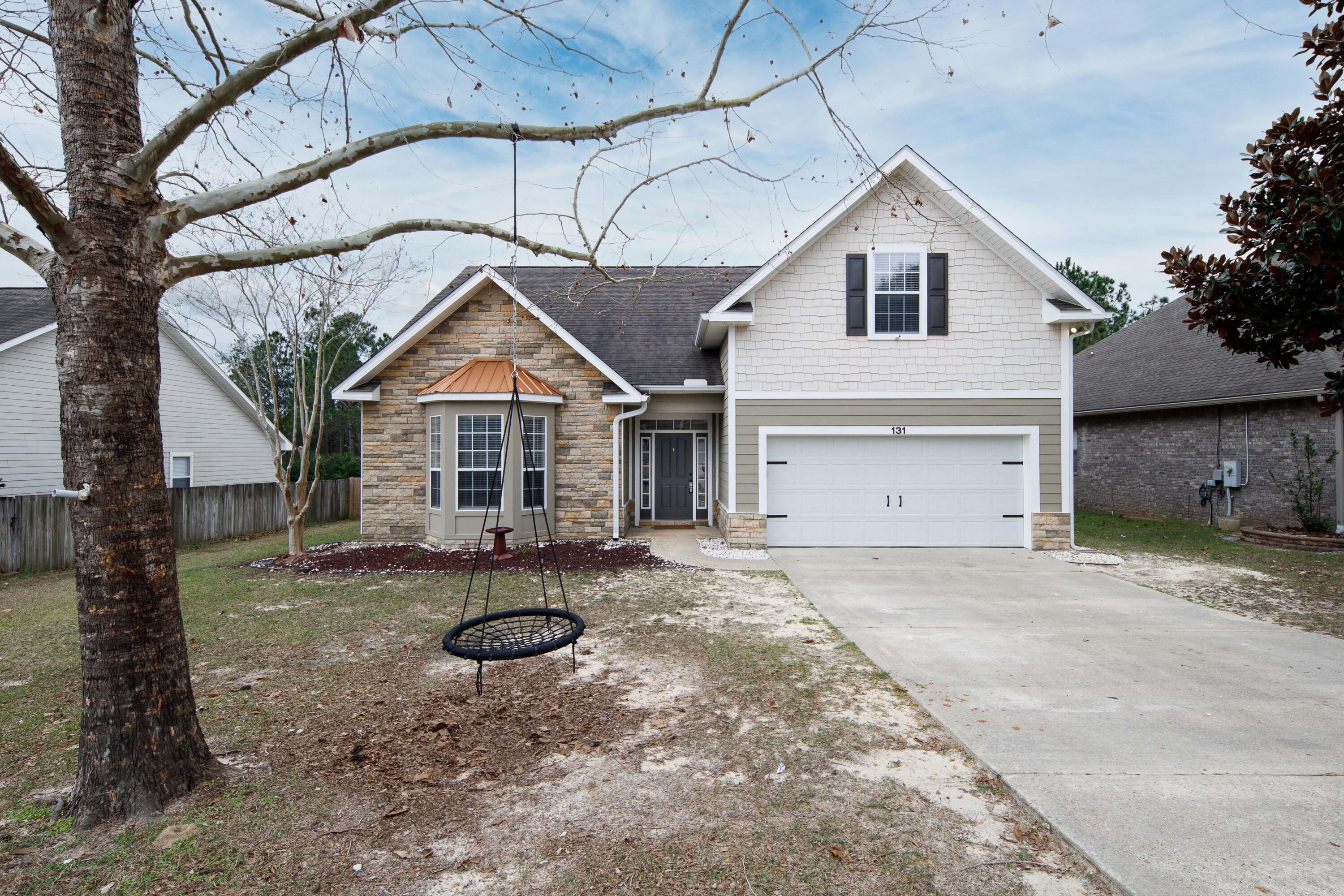This charming home in South Crestview is filled with unique touches, a welcoming floorplan, and wonderful outdoor space for relaxing and entertaining. With an excellent location south of I-10 and in close proximity to military bases and you can easily enjoy all that the beautiful Emerald Coast has to offer. With multiple different entertaining areas downstairs as well as three bedrooms, and one large flex space upstairs that can be utilized as an additional bedroom your possibilities are endless. Enjoy your large lot and sitting on your oversized back porch with the privacy of no neighbors behind your backyard, just beautiful woodlands. Call to make an appointment to come see this beautiful home today!