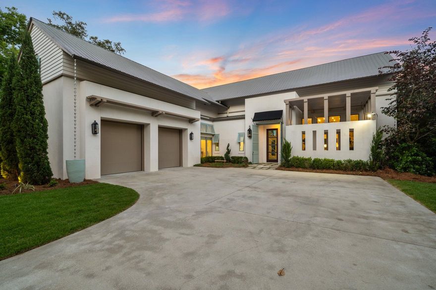 Boater's Dream in Botany Bayou - Luxury Meets LocationWelcome to this extraordinary waterfront retreat in the secluded, gated enclave of Botany Bayou -- ideally located between the bay and Scenic 30A. Set on nearly an acre and offering deep water access, this stunning 4,351 sq. ft. residence was fully remodeled in 2019 with a design aesthetic inspired by Alys Beach.This 4-bedroom, 4.5-bath home features a dedicated office, media room, and soaring vaulted ceilings with exposed beams that elevate the light-filled, modern interior. High-end finishes include shiplap walls, custom lighting, hardwood floors, and a beautiful fireplace that anchors the main living space.The chef's kitchen is equipped with top-of-the-line appliances, including a Sub-Zero fridge, Wolf gas cooktop,  Bosch dishwasher, Scotsman ice maker, Wolf built-in coffee system, and wine fridge. The spacious primary suite is located on the main floor and features his-and-her walk-in closets and a spa-like bathroom retreat.
Upstairs, you will find two additional guest suites with en-suite bathrooms, a media room with a wet bar, and a cozy bunk room with matching sets of built-in bunks. 
Step outside and experience the ultimate in outdoor living: a custom negative-edge pool and spa, summer kitchen, fire pit, and private dock with boat lift and jet ski lift, all set against the tranquil backdrop of the bayou.