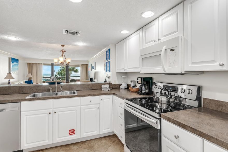 Here's your chance to own a  Gulf front unit at the highly desired Edgewater Beach Condominium!  Gated complex with exquisite grounds and lots of amenities.  Unit 213 is located on the south end of the building with great views and an elevator close by making getting to the pool and beach just steps away.  Unit being sold furnished!  New LV flooring added 2021 to main living space and bedrooms-NO CARPET! Dishwasher, stove and fridge were upgraded in 2020!  Carefree, beach retreat with a New HVAC and a 3 year old water heater!   Edgewater boasts over 400' of beach frontage, two pools, fitness room, playground and basketball court, gated entrance covered parking and more!